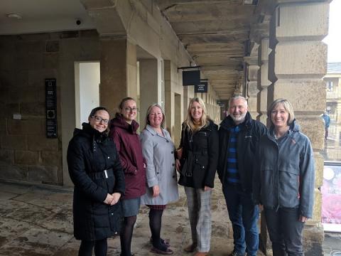 6 members of the take ten pilot out for a walk in Piece Hall, Halifax. 