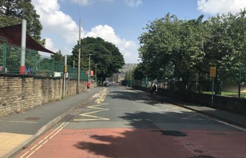 A street by a Calderdale school with no cars parked outside, as the road is closed to vehicles